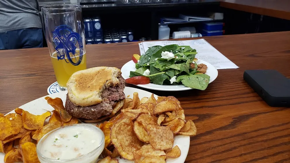 Buffalo Burger with Sweet Potato and Potato Chips and a Spinach Salad on the Side